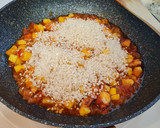 Foto del paso 3 de la receta: Arroz con pulpo y langostinos