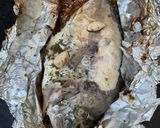 Une image de l'étape 6 de Dorades royales en papillote à l ail, citron et persil avec piments grillés.