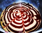 A picture of step 9 of Zebra Chocolate Cake.