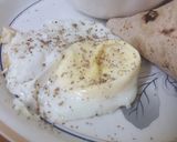A picture of step 3 of Half fried egg with bread for breakfast.