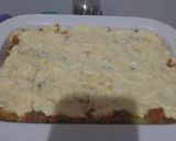 Foto langkah ke 6 dari resep Cheesy Bolognese Baked Potatoes.
