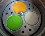 A picture of step 3 of Tricolour Idli.
