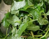 A picture of step 1 of Thotakura gravy(amaranth leaves).