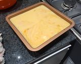Foto del paso 5 de la receta: Flan casero con un papá que es un dulce de leche