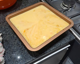 Foto del paso 5 de la receta: Flan casero con un papá que es un dulce de leche