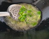 A picture of step 1 of Capsicum-Onion Curry in a Yogurt-Based Red Gravy.