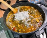 A picture of step 21 of Chicken Curry with Chickpeas, Eggplant, and Spinach.