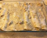 A picture of step 6 of Chicken Enchiladas (white sauce).