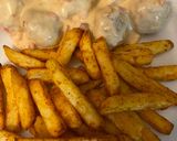 A picture of step 2 of Bacon cheeseburger meatballs with fries.