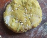A picture of step 2 of Til masala poori.