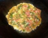 A picture of step 3 of Masala omellette.