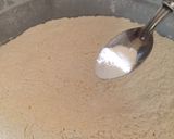 A picture of step 1 of Patheera with onion sauce.