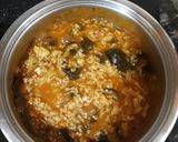 Foto del paso 6 de la receta Arroz meloso con tómate frito y bacalao
