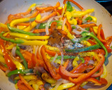 A picture of step 5 of Keto Wors and Sweet Peppers.