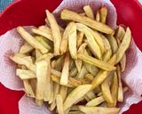 A picture of step 1 of Fries in Garlic dhania Barbecue sauce.