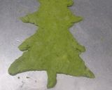 A picture of step 2 of Tomato santa with spinach Christmas trees.