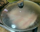 A picture of step 5 of Salt-Grilled Saba with frying pan.