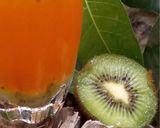 A picture of step 1 of Orange and kiwi cooler.
