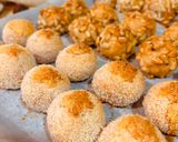 A picture of step 15 of “PANELLETS” (sweet potato balls made with coconut, pine nuts, or almonds).