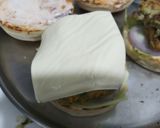 A picture of step 4 of Paneer aloo double patty cheese burger.
