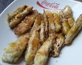 Foto del paso 7 de la receta: Bastones de berenjena empanizados con sal de miel de panela, ajo y mostaza🤔🤨😊