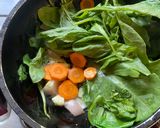 A picture of step 2 of Winter Herbal Chicken Spinach Soup.