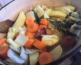 A picture of step 7 of Chinese Cabbage Stew with Potatoes, Carrots, Onions, Sausage, and Bacon.