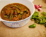 A picture of step 8 of Bhindi gosht.