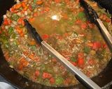 A picture of step 4 of Creole Smothered Pork Chops.