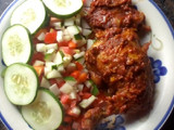 Peppered chicken with cucumber and tomato salad