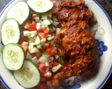 A picture of step 1 of Peppered chicken with cucumber and tomato salad.