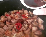 Foto del paso 6 de la receta: Fideos con butifarra, costillas, calamar y piquillos