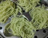 A picture of step 12 of Colourful Stringhoppers with Crab stew.