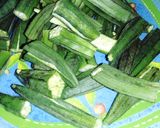 A picture of step 1 of Bhindi Posto.