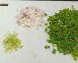 A picture of step 1 of Herbed Spring Onion Fried Rice.