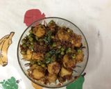 A picture of step 2 of Chicken sausages with green peas.
