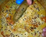 A picture of step 7 of Pizza Naan.