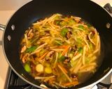 A picture of step 6 of Mixed seafood fried rice noodles.