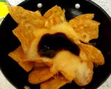 A picture of step 2 of My Cheeky Nancho,s with Cheese also a blob of whisky BBQ sauce😋.