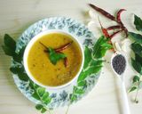 A picture of step 6 of Moong dal mango curry.
