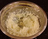 A picture of step 9 of Cinnamon Layer Cake with Whipped Cinnamon Cream Filling and Frosting.
