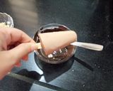 A picture of step 8 of Oreo Banana Kulfi with walnuts fudge.
