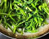 A picture of step 4 of Unbeatable Garlic Stir-Fried Water Spinach.