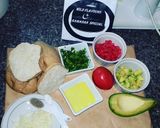 A picture of step 1 of Cheesy bread with tomatoes & avocado salsa.
