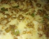 A picture of step 6 of Chicken Tikka pizza.