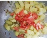 A picture of step 5 of Desi mix sabzi.