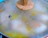 Foto del paso 7 de la receta Muslos de pollo en salsa de limón, azafrán y ajos tiernos