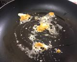 A picture of step 2 of Golden Salted Egg Dumplings (Salted Egg Stir-Fried Dumplings).