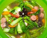 Foto langkah ke 5 dari resep Pokcoy Tumis Jamur Kuping.