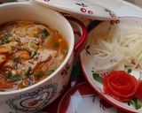 A picture of step 3 of Tomato Hủ Tiếu Noodle Soup.
